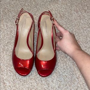Red peep toe pumps